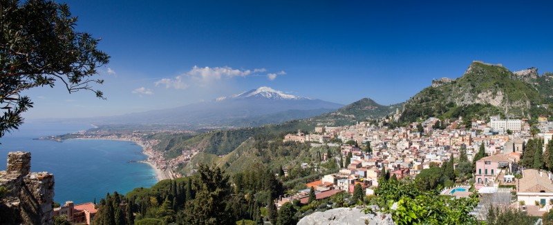 Panorama Of Taormina With The Etna Volcano